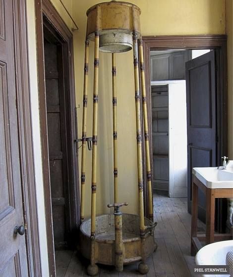 The English Regency Shower around 10 ft tall with metal pipes painted to look like bamboo