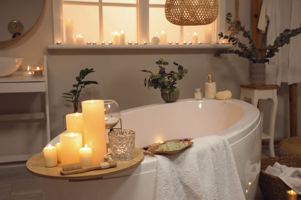 Candles were light inside a bathroom to create certain scents